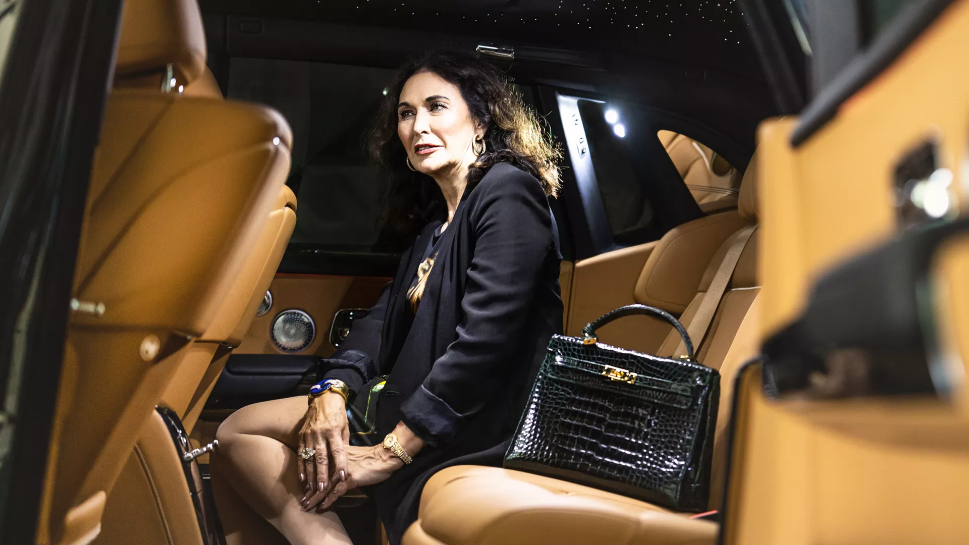 Lee sat in the back of a Phantom